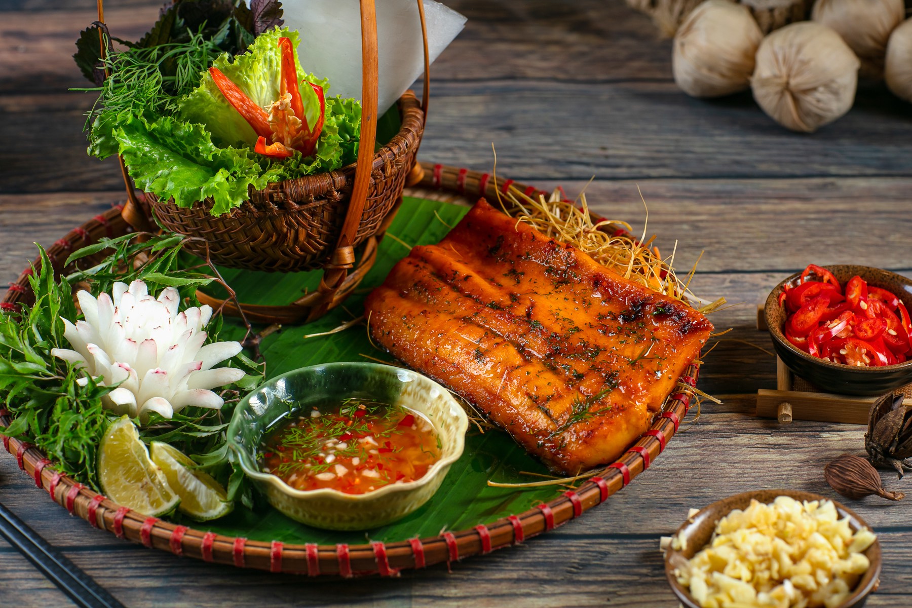Salt and chilli grilled fish with fresh herbs
